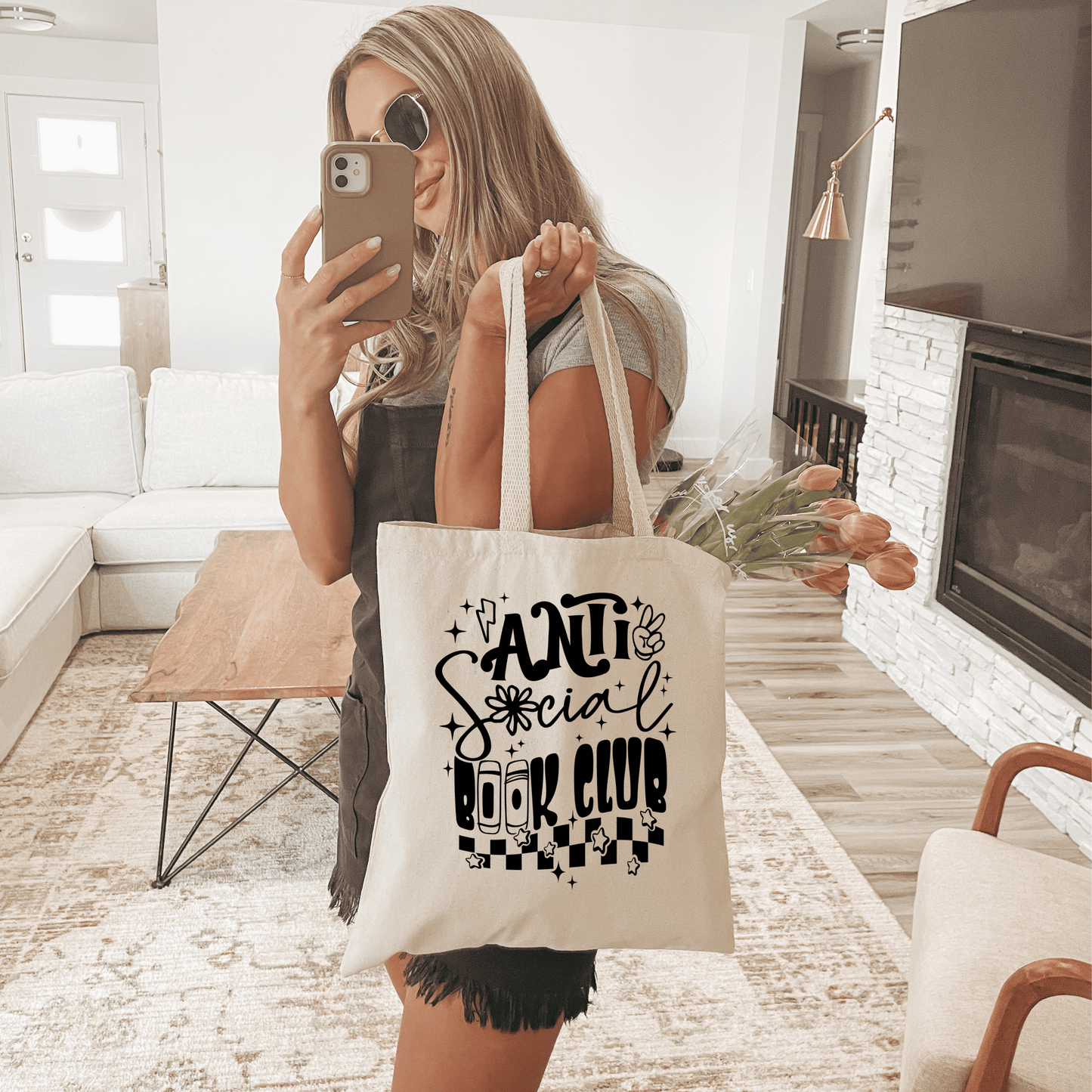Reusable tote bag for book lovers with a literary design